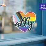 Welcoming LGBTQ+ Straight Ally Heart Vinyl Sticker Displayed on Glass front window